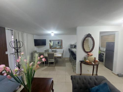 a living room with a couch and a table at Residencia en Mitras Poniente García in Monterrey