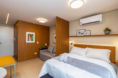 Ένα ή περισσότερα κρεβάτια σε δωμάτιο στο Studio Premium p/ 4 pessoas no All Batel - BAT1816