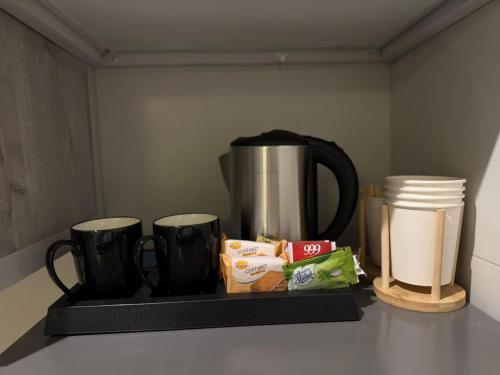 Kaffee-/Teezubehör in der Unterkunft شقة فاخرة بحي الزهراء