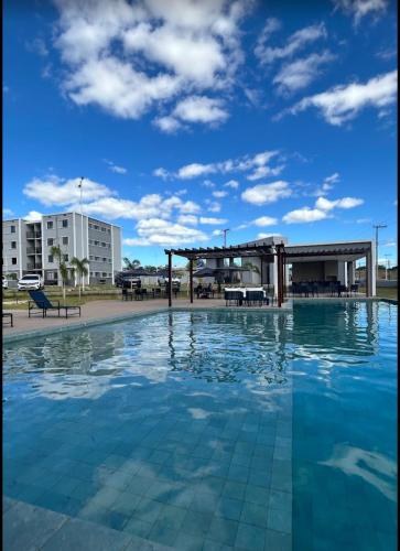 Πισίνα στο ή κοντά στο Apto com dois quartos com cama e ar