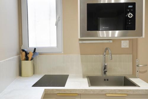 Küche/Küchenzeile in der Unterkunft Le Fleury