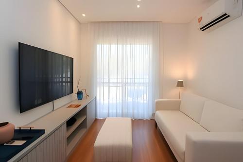 Телевизор и/или развлекательный центр в A6/404-Cobertura Duplex ao lado MorumBIS Einstein com Jacuzzi