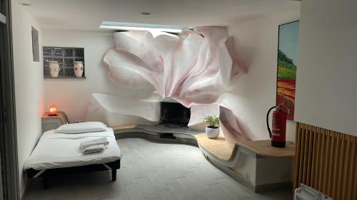 Postel nebo postele na pokoji v ubytování Alloggio turistico La Taverna