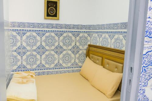 Postel nebo postele na pokoji v ubytování DAR Souaad Bab Doukkala