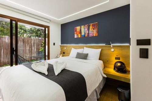 Postel nebo postele na pokoji v ubytování Elite Maya Hotel & Spa