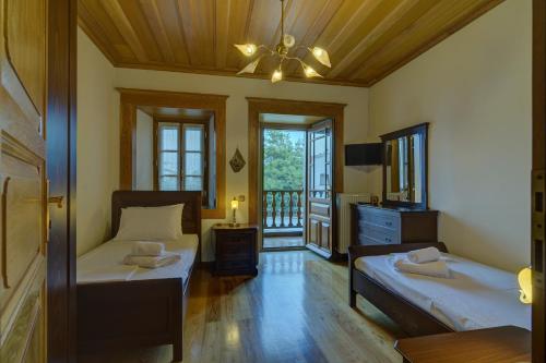 Ένα ή περισσότερα κρεβάτια σε δωμάτιο στο Villa Sikioti