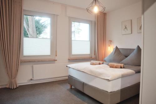 Postel nebo postele na pokoji v ubytování City-Apartment nähe Maschsee Komfort - Tierfreundlich