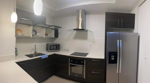 Kuchyň nebo kuchyňský kout v ubytování ParkHurst Signature Suite