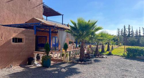 Κήπος έξω από το Villa calme avec piscine près de Marrakech