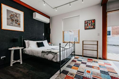 Giường trong phòng chung tại Union Street - Central Castlemaine Pad