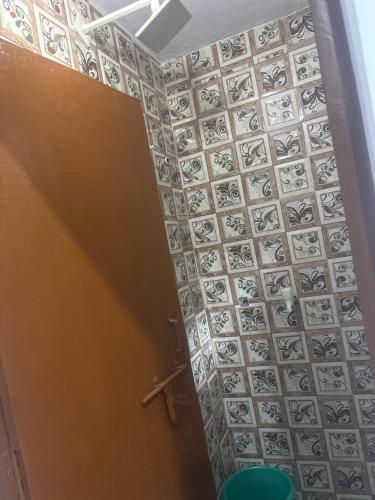 Ένα μπάνιο στο Bhumika home stay