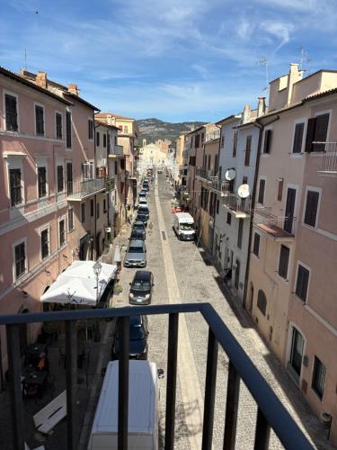a view of a street from a balcony of a building at Sole Suite & Boutique Rooms in Norma