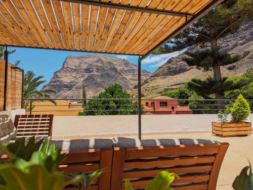 バジェ・グラン・レイにあるApartamentos Los Mirlosのパティオからの山の景色