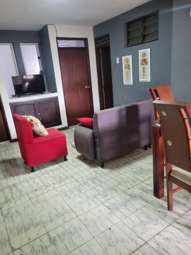 Un lugar para sentarse en Apartahotel Real