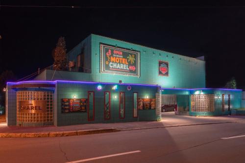 a building with blue lights on the side of it at ホテルシャレル in Chikabumichō