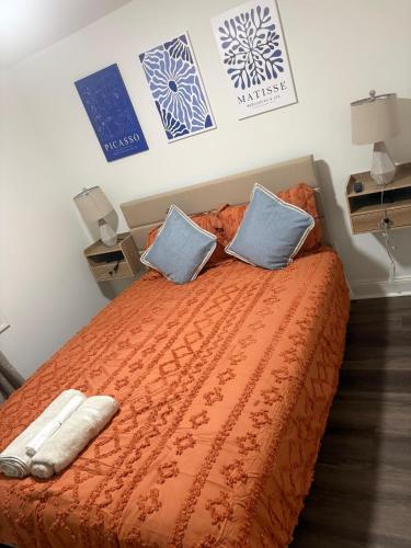 a bedroom with a bed with two pillows on it at Game Day Ready! 2 King Beds Near UGA & DT in Athens