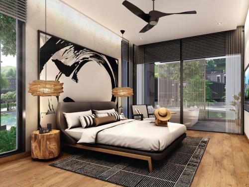 Postel nebo postele na pokoji v ubytování MontAzure Resort Phuket - MGallery Collection