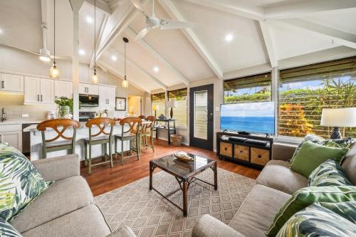 a living room with a couch and a table at International Colony Club 13 · ICC 13 Beautifully Furnish Kaanap in Lahaina