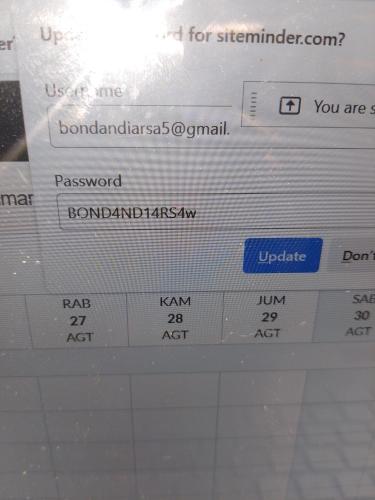 a screenshot of a cell phone screen with a confirmation email at wirati Jeneng Guest house in Kerobokan