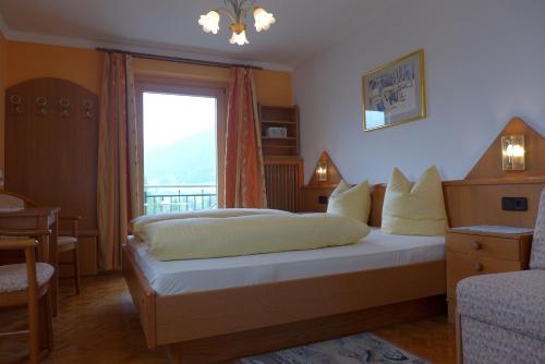 Cama o camas de una habitación en Haus Salzburgerland