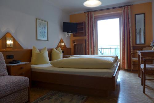 Cama o camas de una habitación en Haus Salzburgerland