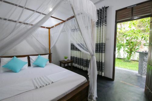 Katil atau katil-katil dalam bilik di Oreli Villa