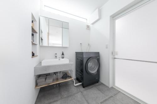 Ένα μπάνιο στο 暁の宿