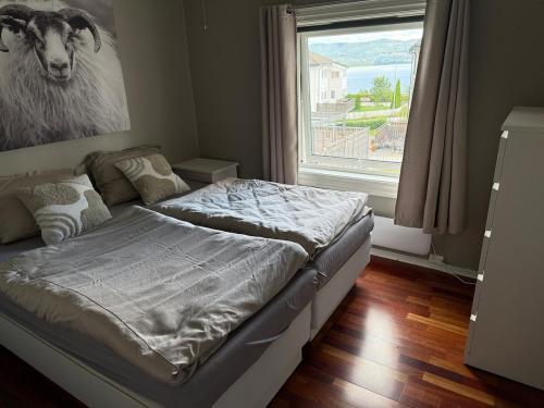 Ένα ή περισσότερα κρεβάτια σε δωμάτιο στο Private apartment on Hedensrud