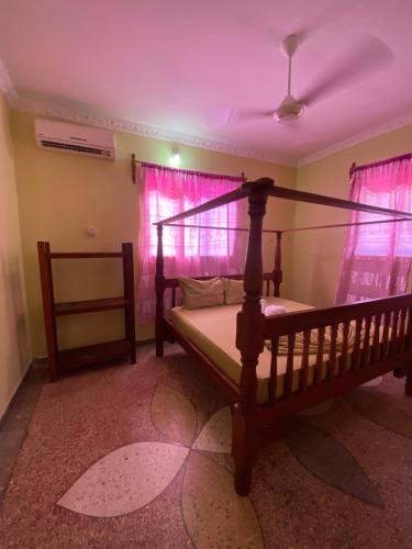 Ένα ή περισσότερα κρεβάτια σε δωμάτιο στο Zazu Beach House