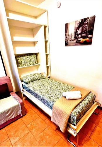 a room with a bunk bed in a room at TT House Rho Fiera Milano Station in Rho