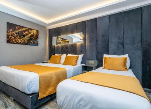 Ένα ή περισσότερα κρεβάτια σε δωμάτιο στο 216 Silver Suite