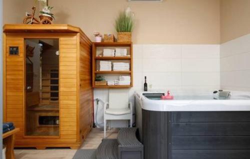 a kitchen with a sink and a bath tub at Holiday home Lisnjak by Villas Guide in Trbounje