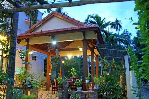 A patio or other outdoor area at Village Love Homestay