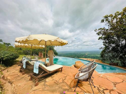 Bazén v ubytování PUMZIKA-TU Shimba hills , Diani nebo v jeho okolí