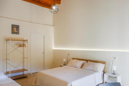 Ένα ή περισσότερα κρεβάτια σε δωμάτιο στο Rihal Rooms
