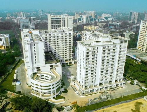 an aerial view of a large white building at Hotel Royal King in Lucknow