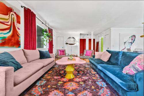 a living room with a couch and a table at Bachelorette Retreat in Nashville in Providence