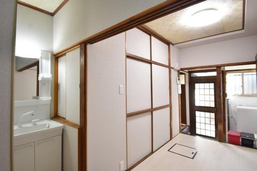 Koupelna v ubytování Guest House -SASAKI-