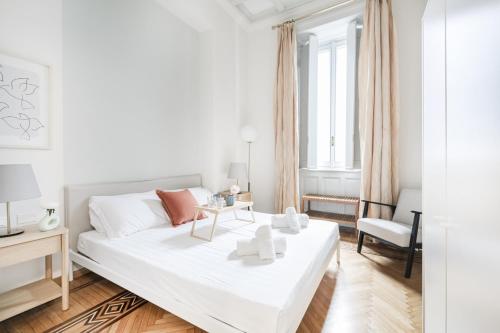 Giường trong phòng chung tại Easylife - Milano - Mazzini 20 - Duomo