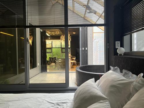 En eller flere senge i et værelse på gwangju-stay-dosim