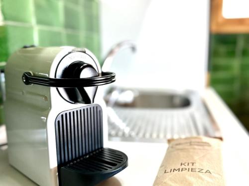 Fotografie z fotogalerie ubytování Marmota, Ático en Llívia, jardín comunitario con piscina y pista de tenis v destinaci Llivia