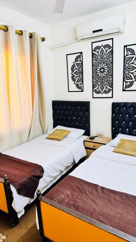 Krevet ili kreveti u jedinici u objektu New Hamoudeh Hotel
