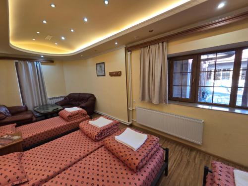 Postel nebo postele na pokoji v ubytování DALLAR Guest House