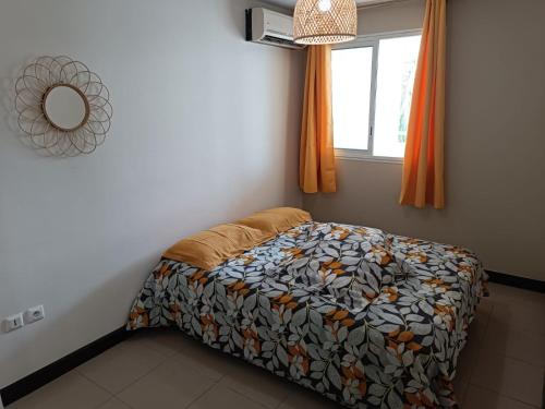 Ένα ή περισσότερα κρεβάτια σε δωμάτιο στο KDS appartement T2 Île de la Réunion