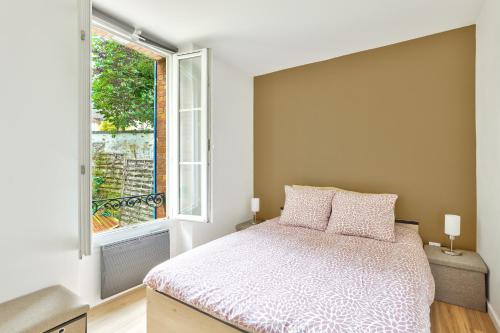 Postel nebo postele na pokoji v ubytování Brie Lodge - Centre de Tournan