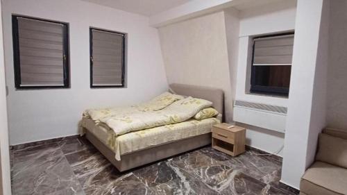 Ένα ή περισσότερα κρεβάτια σε δωμάτιο στο Apartments Gaga