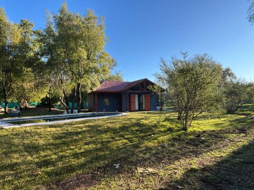 O grădină în afara Casa La Miel