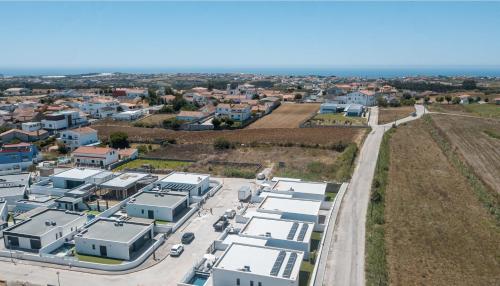 an aerial view of a city with buildings at Villa Laura with private swimming pool in Lourinhã