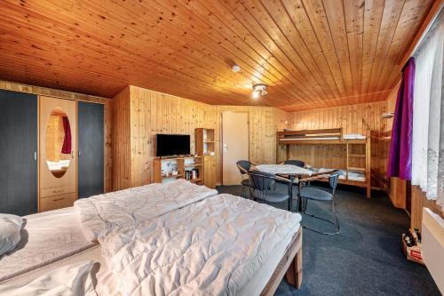 Ένα ή περισσότερα κρεβάτια σε δωμάτιο στο Bungalow 11 - Kimbucht