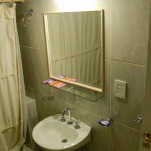 a bathroom with a sink and a mirror at Cuesta de Miranda 2 in Villa Unión